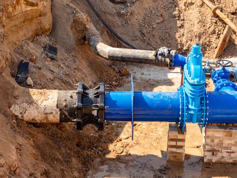 Construction site of a new hydraulic system of drinking water to be carried out under the road surface level.