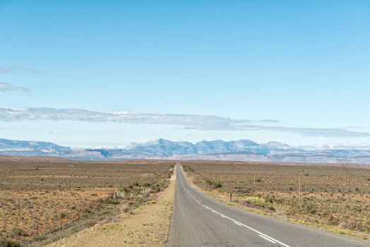 Landscape on road N12 between Beaufort West and Klaarstroom. The Swartberg mountains are visible in the back