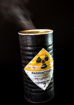 Smoke in the old cylinder container of radioactive material