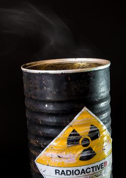 Smoke in the old cylinder container of radioactive material