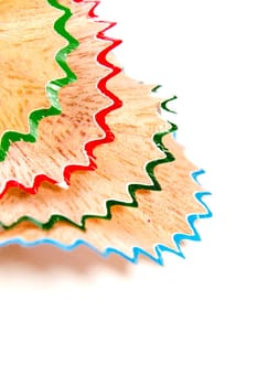 Space and colorful crayon pencil wood shavings