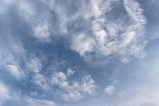 White clouds on a blue sky. It can be used as background and texture.