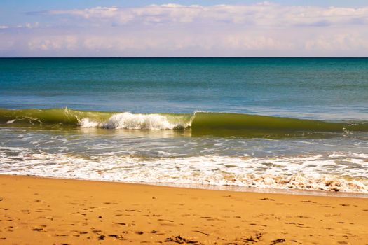 Sunny day on the beach in winter in La Marina, Alicante