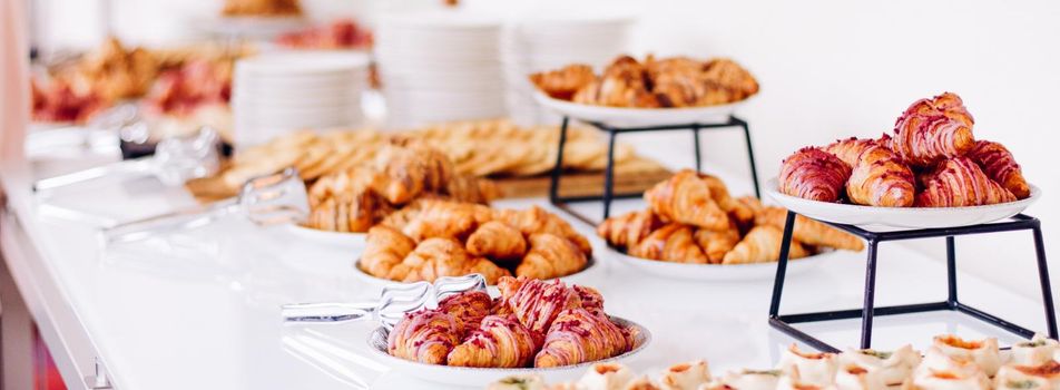 Pastry, cookies and croissants, sweet desserts served at charity event - food, drinks and menu concept as holiday background banner for luxury brand design