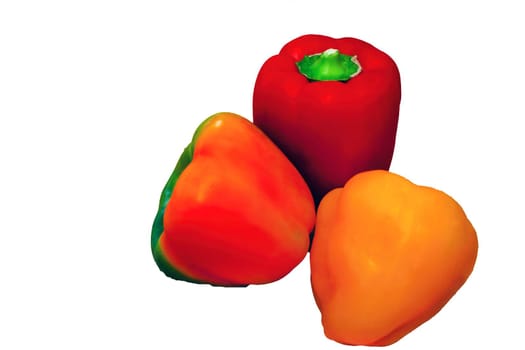 Beautiful fresh multi-colored peppers on a white background