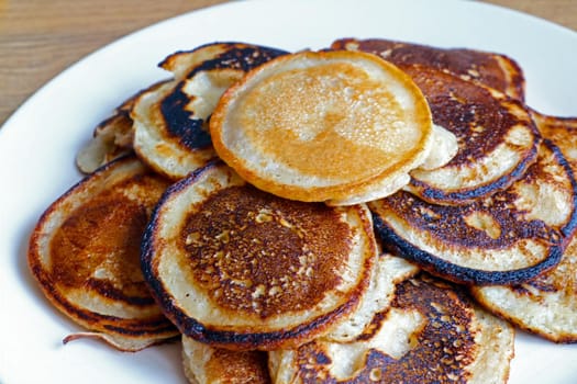 Beautiful fragrant yellow pancakes for breakfast. Light snack