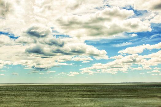 Beach and cloudy sky in the morning in Santa Pola, a small fishing village in southern Spain