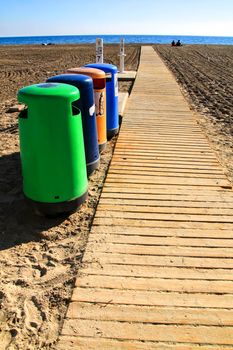 Colorful Recycling bins on the beach in Santa Pola, Alicante