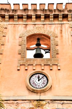 Tower and belfry of the Fortress castle of the fishing village of Santa Pola, Alicante, Spain