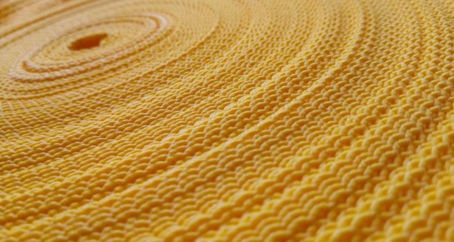 Beautiful yellow abstract background. Circular pattern of yellow sling.