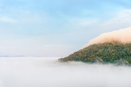 Beautiful nature landscape fog in the valley and the green mountain at the high angle viewpoint. Famous tourist attractions at Khao Kho district, Phetchabun province Thailand