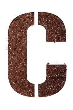 stencil letter C made above dirt on white surface