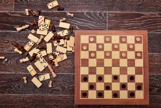 checkers chess dominoes and backgammon. set of board games.