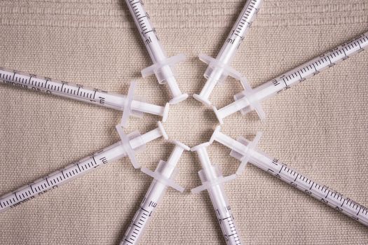 Syringes for injecting insulin in a circle. No people