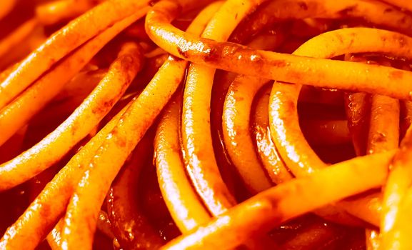 close-up view of cooked spaghetti with tomato sauce. Italian food. Pasta and carbohydrates