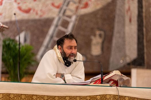 terni,italy may 21 2021:priests during the holy mass in the church of sacro cuore terni