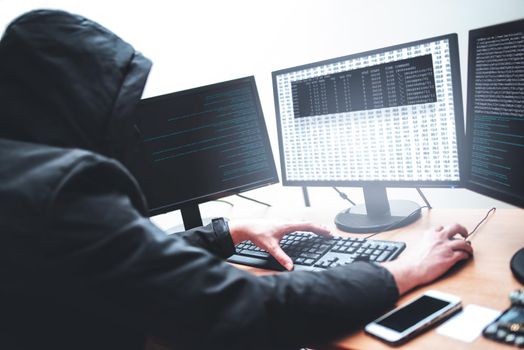 hack concept. Picture of male hacker trying to steal information from system while looking at computer, isolated on white background