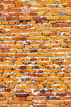 Wall texture from red old damaged bricks. Abstract background for design.