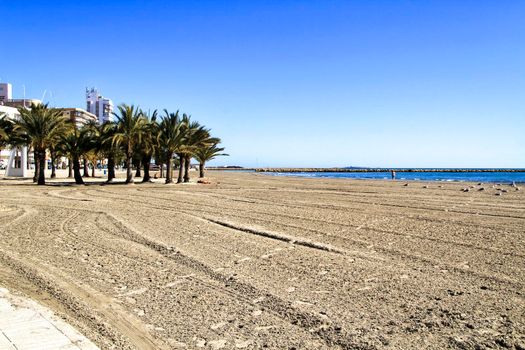 Sunny day on the beach in winter in Santa Pola, Alicante