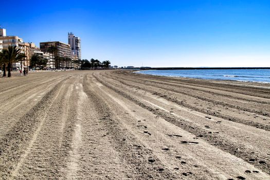 Sunny day on the beach in winter in Santa Pola, Alicante