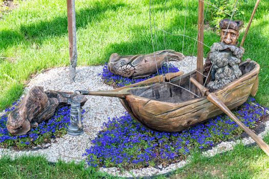 sculpture of a fisherman in the park close-up. High quality photo