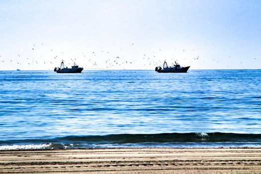 Fishing boat entering port in southern Spain, Santa Pola, Alicante