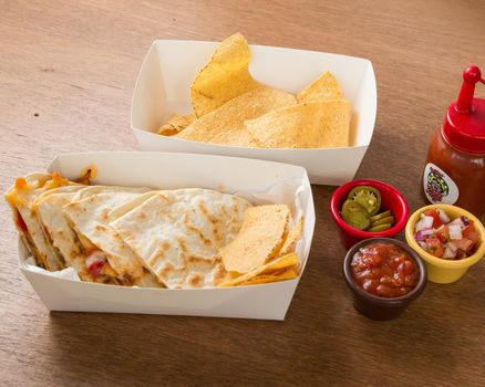 Mix of Mexican food on restaurant table