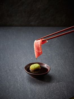 Raw tuna slice or tuna sashimi