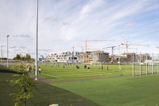 Reykjavik, Iceland, July2019: soccer sports field with kids training for football in Iceland