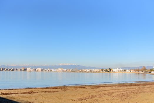 ROSES, SPAIN - jan 24 2018 : Beach and city view of mediterranean town Roses. jan 24 2018 in Catalonia, Spain