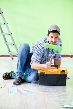 Young man doing home renovation 