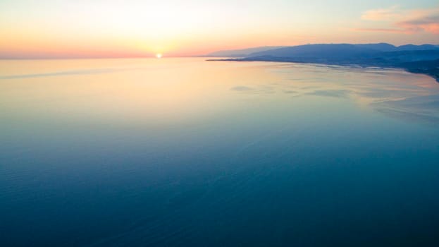 Aerial view of the seascape at sunset.