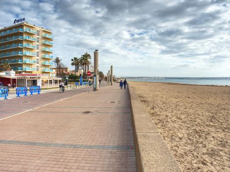 Beautiful sandy beach at Palma de Mallorca on Mallorca island, Spain Mediterranean Sea.  Palma de Mallorca 26th of January 2020.