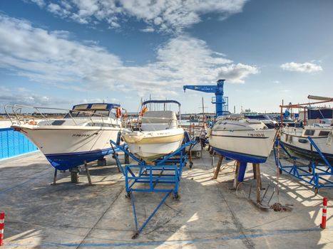 Three Boats in Dry Dock. Yacht port at Palma de Mallorca city, 26thof January 2020