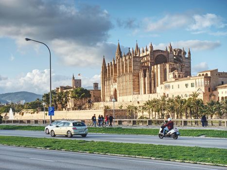 Photo of the Cathedral of Santa Maria of Palma de Mallorca from shore promenade. 26th of January 2020