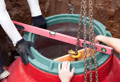 Installation of underground tank for sewage system