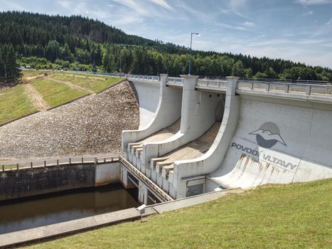 The main weir on popular Lipno lake dam on Vltava river.    17th of July 2019, Czech Republic.  Povodi Vltavy - Vltava catchment basin