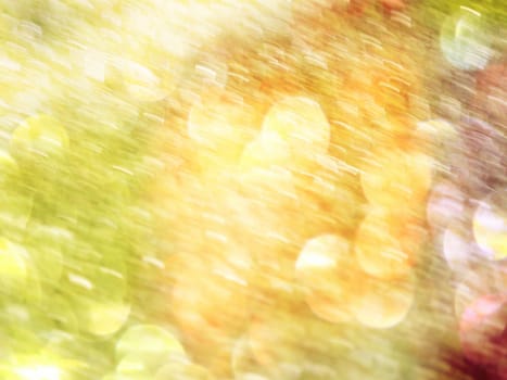 Defocused leaves in water for natural background. Blurred and defocused colors in stream, orange leaves on gravel. Blurry effect.