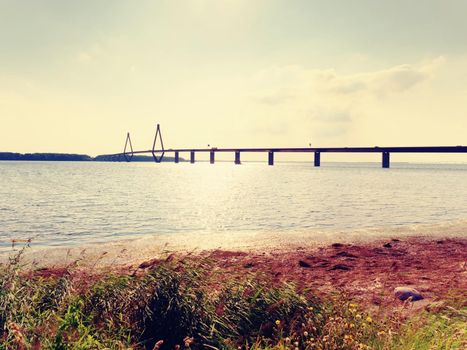 The famous Farø Bridge  in Denmark (Danish: Farøbroerne). The two road bridge connect the islands of Falster and Zealand, view from Farø island.