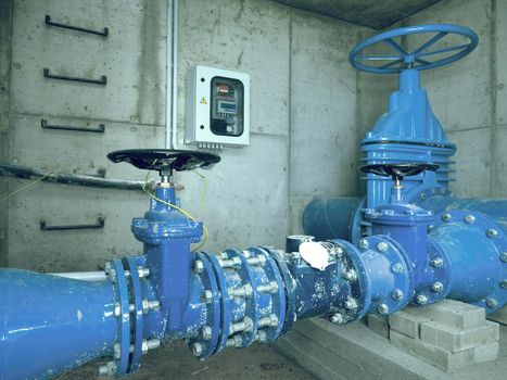 The City water service. 500mm large drink water pipeline with gate valve, 250mm branch. The main underground water armature shafts after renovation. 