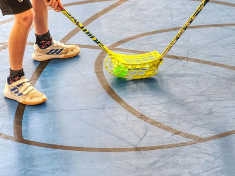 March 12th 2019, Floorball Fat Pipe Open Junior 2019,  Zakupy, Czech Republic.  Player in the bully area. Man playing floor hockey on court.