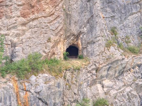 Adit in old abandoned limestone quarry Velka Amerika.  Medieval tunnel adit exposed by modern mining in the 1950s.