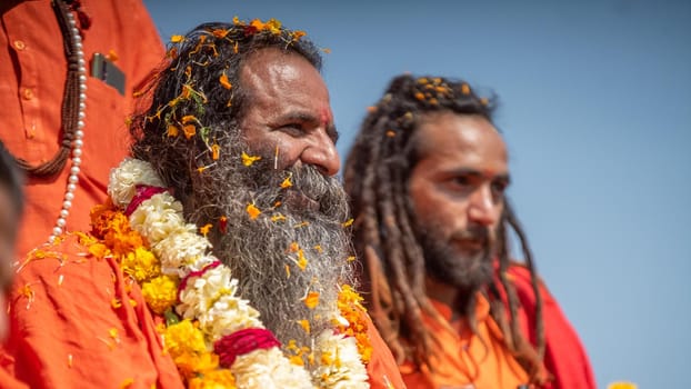 Haridwar, Uttarakhand. India- March 5, 2021- Indian sadhus coming to Kumbh Mela, Royal welcome. Sadhus sitting in rides, wearing a garland,