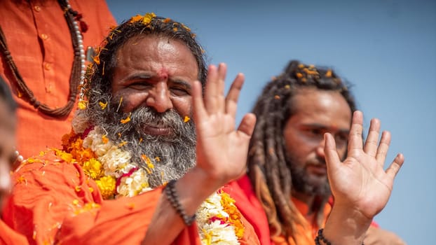 Haridwar, Uttarakhand. India- March 5, 2021- Indian sadhus coming to Kumbh Mela, Royal welcome. Sadhus sitting in rides, wearing a garland,