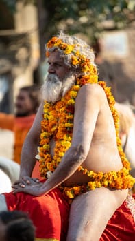 Haridwar, Uttarakhand. India- March 5, 2021- Indian sadhus coming to Kumbh Mela, Royal welcome. Sadhus sitting in rides, wearing a garland,