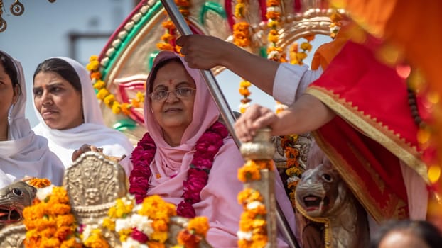 Haridwar, Uttarakhand. India- March 5, 2021- Indian sadhus coming to Kumbh Mela, Royal welcome. Sadhus sitting in rides, wearing a garland,