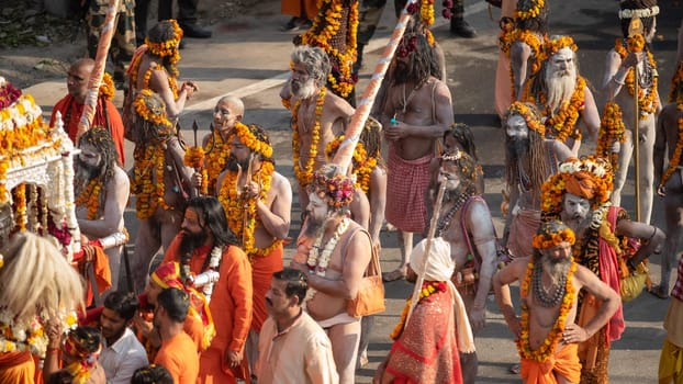 Haridwar, Uttarakhand. India- March 5, 2021- Indian sadhus coming to Kumbh Mela, Royal welcome. Sadhus sitting in rides, wearing a garland,