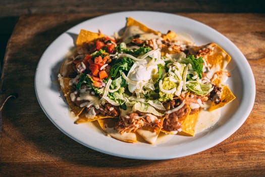 A plate of creamy nachos snack