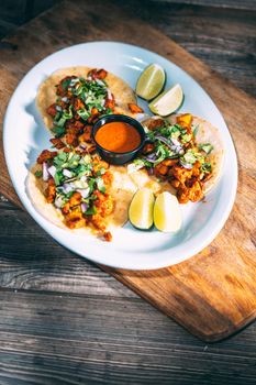 A plate of tacos and tortilla snacks