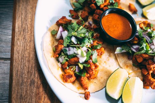 A plate of tacos and tortilla snacks